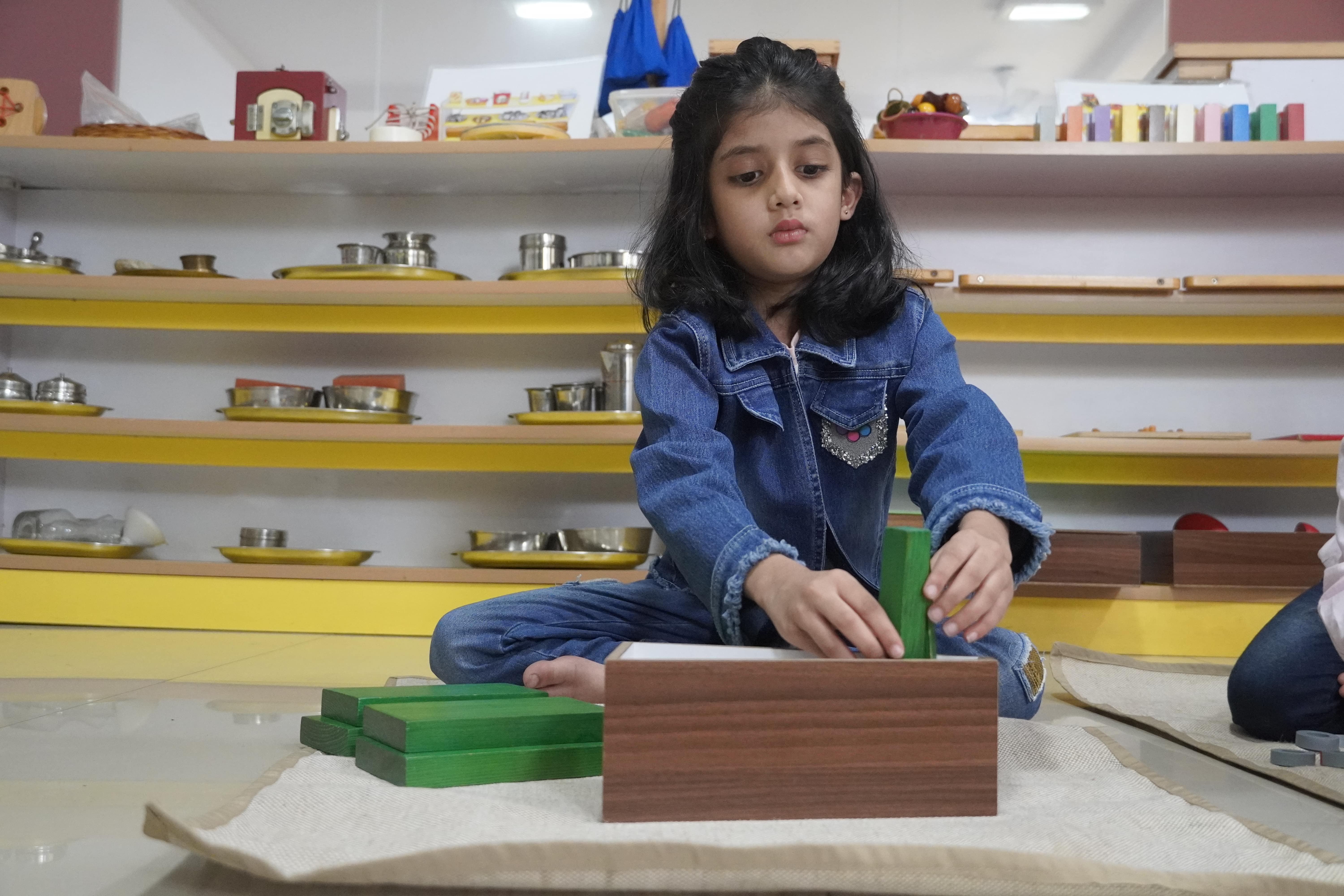 Children engaged in sensory learning activities